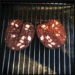 Sliced Chadwick's Bury Black Pudding ready to be grilled.